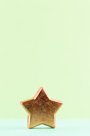 Christmas star, decor on pastel colored background. Christmas or New Year minimal concept.の写真素材