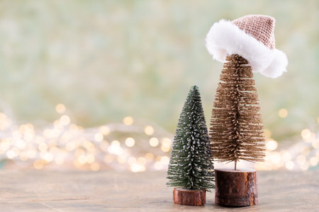 Colorful Christmas tree on green, bokeh background.の写真素材