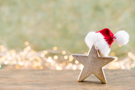 Christmas star, decor on bokeh colored background. Christmas or New Year minimal concept.の写真素材