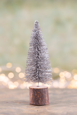 Colorful Christmas tree on green, bokeh background.の写真素材