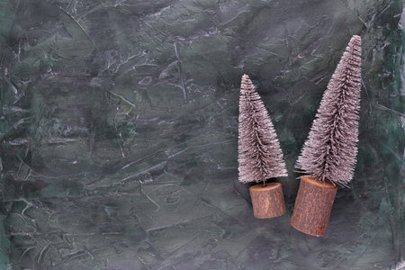 Colorful Christmas tree on wooden, bokeh background. Christmas holiday celebration concept. Greeting card.の写真素材