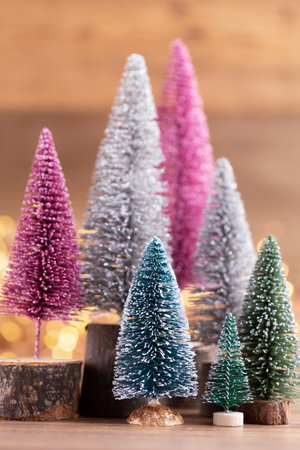 Colorful Christmas tree on bokeh background. Christmas holiday celebration concept. Greeting card.の写真素材