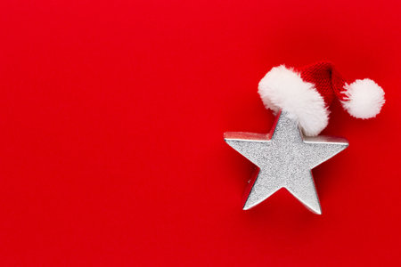Christmas star, decor on pastel colored background. Christmas or New Year minimal concept.の写真素材