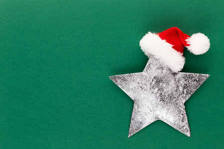 Christmas star, decor on pastel colored background. Christmas or New Year minimal concept.の写真素材