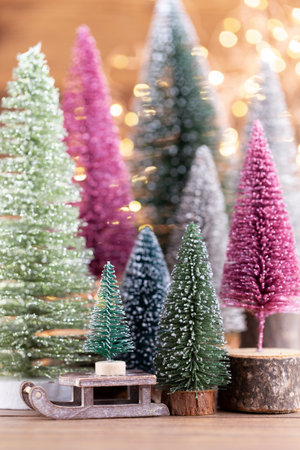 Colorful Christmas tree on bokeh background. Christmas holiday celebration concept. Greeting card.の写真素材