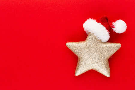 Christmas star, decor on pastel colored background. Christmas or New Year minimal concept.の写真素材