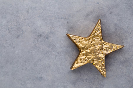 Christmas star, decor on pastel colored background. Christmas or New Year minimal concept.の写真素材