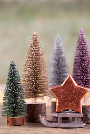 Colorful Christmas tree on green, bokeh background.の写真素材