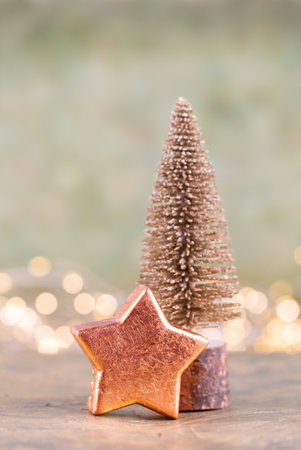 Colorful Christmas tree on green, bokeh background.の写真素材