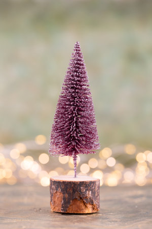 Colorful Christmas tree on green, bokeh background.の写真素材