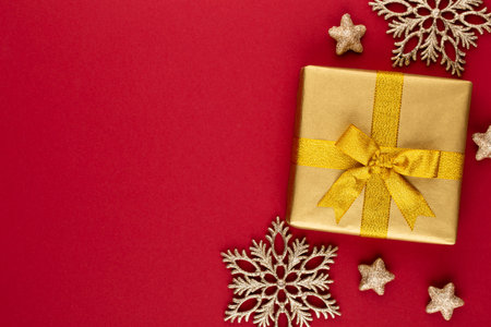 Gift or present box on color table top view. Flat lay composition for birthday, mother day or wedding.の写真素材
