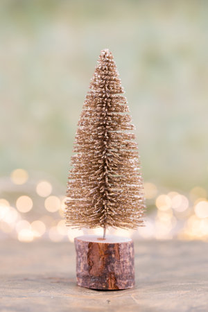 Colorful Christmas tree on green, bokeh background.の写真素材