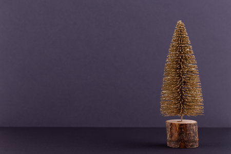 Christmas tree on pastel colored background. Christmas or New Year minimal concept.の写真素材