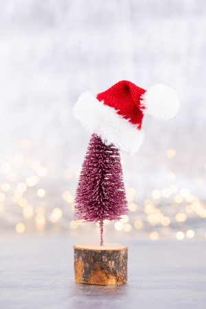 Christmas tree on silver, bokeh background.の写真素材