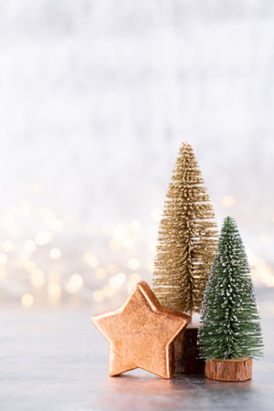 Christmas tree on silver, bokeh background.の写真素材