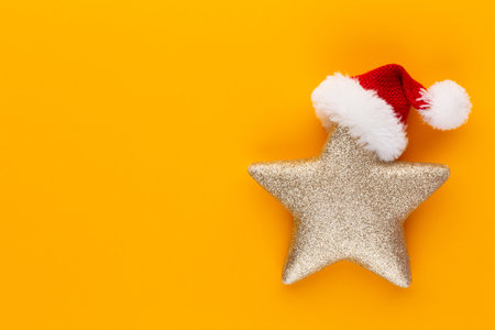Christmas star, decor on pastel colored background. Christmas or New Year minimal concept.の写真素材