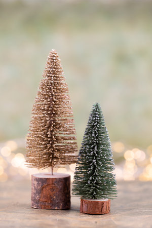 Colorful Christmas tree on green, bokeh background.の写真素材