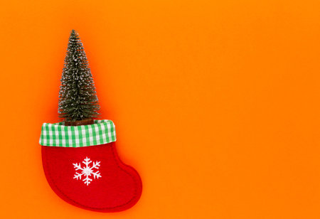 Christmas tree on pastel colored background. Christmas or New Year minimal concept.の写真素材