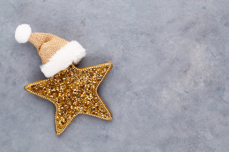 Christmas star, decor on pastel colored background. Christmas or New Year minimal concept.の写真素材