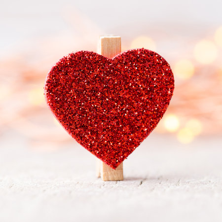 Red heart in bokeh lights background.の写真素材