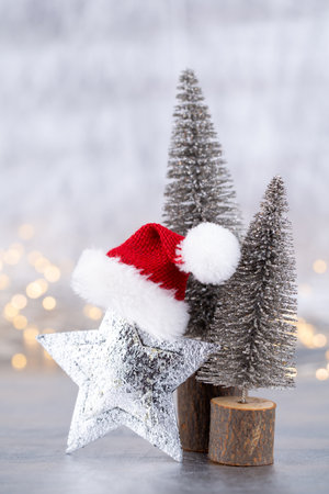Christmas tree on silver, bokeh background.の写真素材