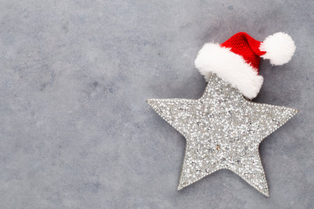 Christmas star, decor on pastel colored background. Christmas or New Year minimal concept.の写真素材