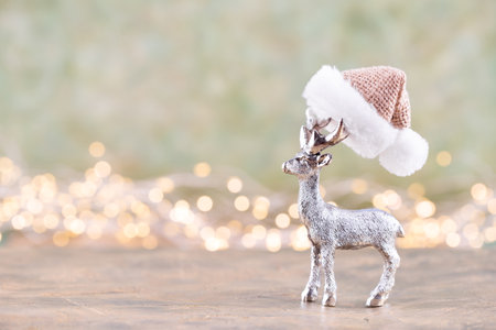 Christmas reindeer on bokeh silver background. Christmas or New Year minimal concept.の写真素材