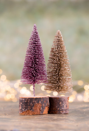 Colorful Christmas tree on green, bokeh background.の写真素材