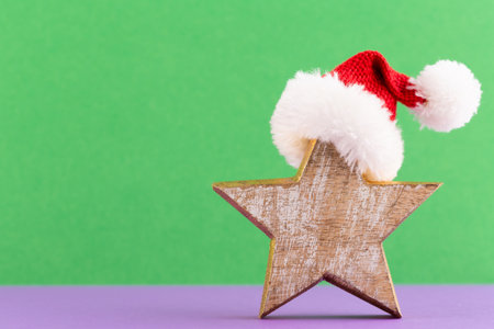 Christmas star, decor on pastel colored background. Christmas or New Year minimal concept.の写真素材