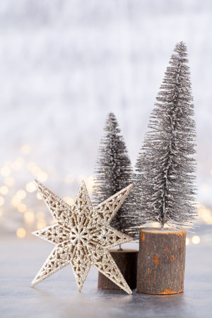 Christmas tree on silver, bokeh background.の写真素材