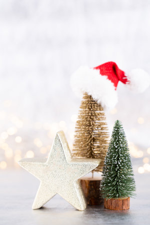 Christmas tree on silver, bokeh background.の写真素材