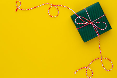 Christmas gift boxes with ribbons on color tabletop.の写真素材