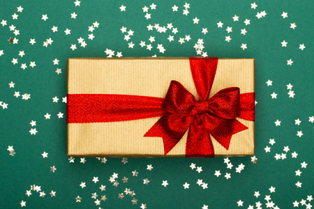 Glittering christmas background. Star dust and golden glitter. Holidays background for web and print.の写真素材