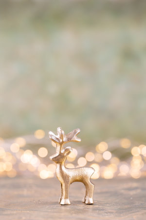 Christmas reindeer on bokeh silver background. Christmas or New Year minimal concept.の写真素材