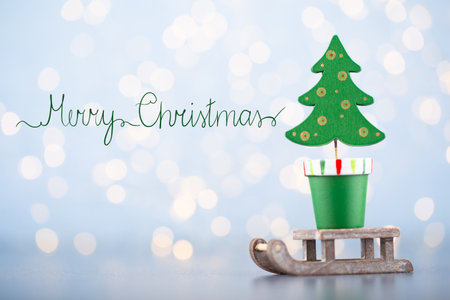 Christmas ball background. Greeting card decorations on a blue bokeh background.の写真素材