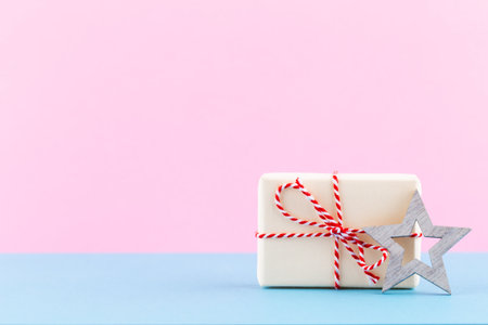 Christmas gift boxes on pastel background.の写真素材