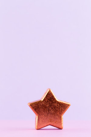 Christmas star, decor on pastel colored background. Christmas or New Year minimal concept.の写真素材