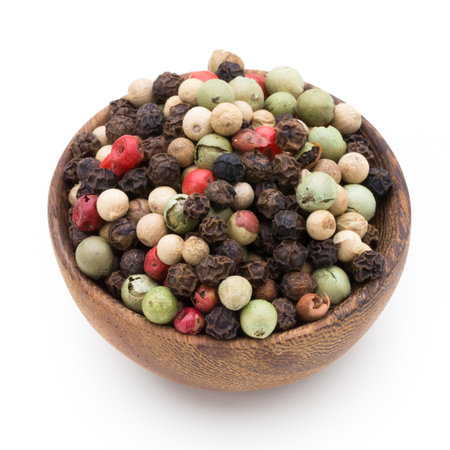 Pepper seed on spoon on white background.の写真素材