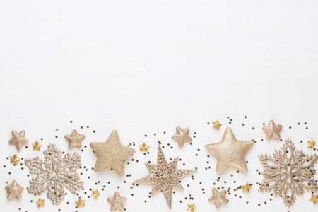 Christmas greeting card. Festive decoration on white wooden background. New Year concept. Copy space.  Flat lay. Top view.の写真素材