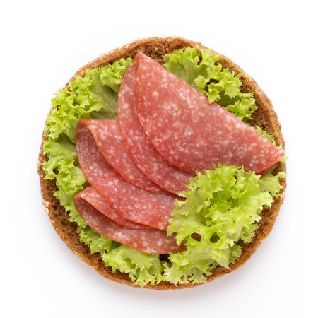 Sandwich with salami sausage on white background. の写真素材