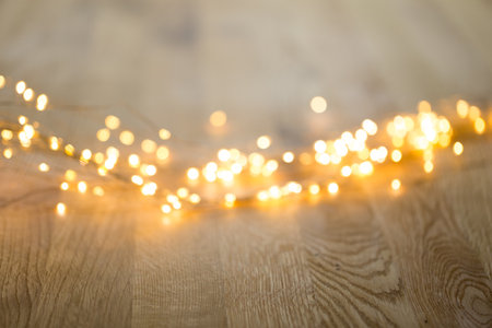 Christmas greeting card. Festive decoration on bokeh background. New Year concept. Copy space.  Flat lay. Top view.の写真素材