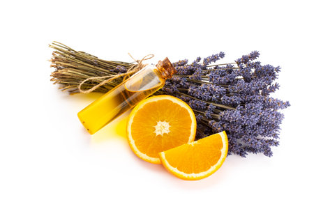 Natural cosmetics with lavender and orange, lemon  for homemade spa on white background top view mock up.の写真素材