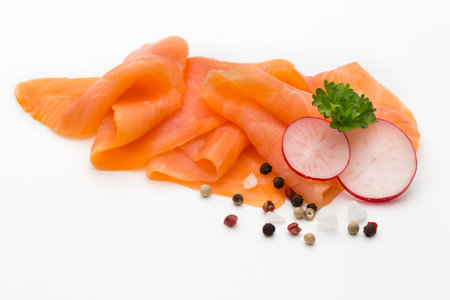 Fresh salmon slice and spice on the white background.の写真素材