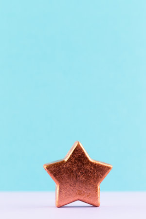 Christmas star, decor on pastel colored background. Christmas or New Year minimal concept.の写真素材