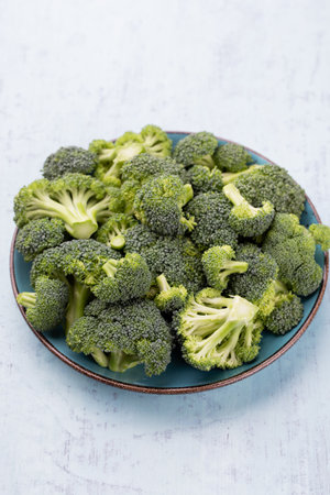 Healthy Green Organic Raw Broccoli Florets Ready for Cookingの写真素材
