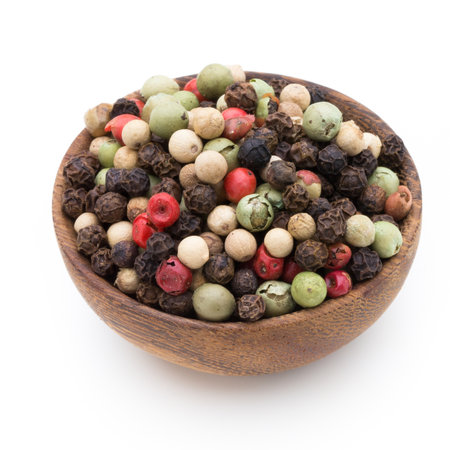 Pepper seed on spoon on white background.の写真素材