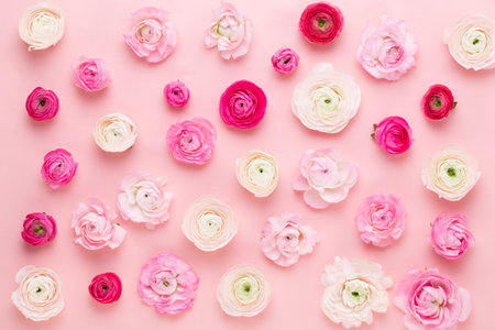 Multiple colorful nicely decorated muffins on a white background, top view.の写真素材