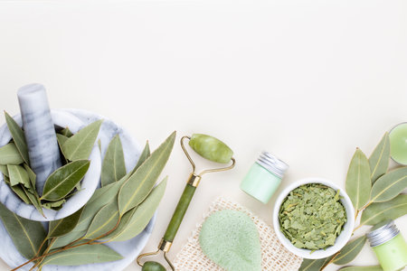 Spa and bath homemade cosmetics. Bottles with spa cosmetic products on pastel background, top view.の写真素材