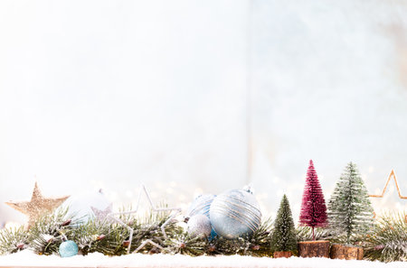 Christmas background with tree and blurred shiny lights.の写真素材