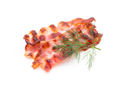 Sliced prosciutto or parma ham isolated on white background. From top viewの写真素材